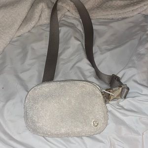 White Sherpa lululemon belt bag gold hardware